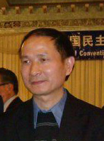 Wang Youcai wearing a dark jacket.