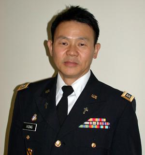 Xiong Yan wearing military uniform with service ribbons.